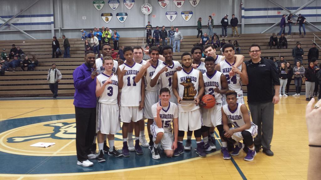 Second half defensive stand gives Woodhaven district title over Wyandotte, 48-40