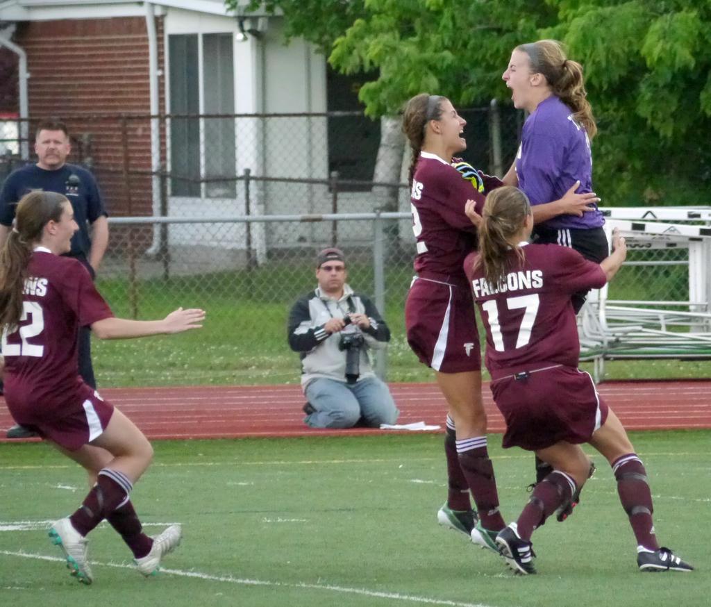 girl kicks girl in head soccer