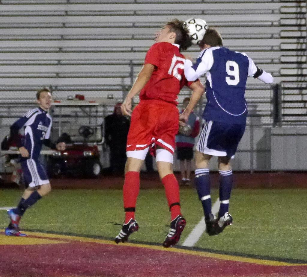 Troy Athens holds on to defeat Sterling Heights Stevenson, 21, in boys