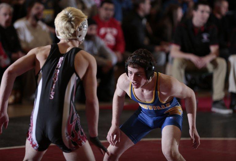 Brian Kuhlman finishes 8th at 113 pounds to Manville's first