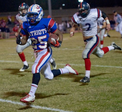 Curtis' Torrey Pierce, who rushed for 80 yards and two touchdowns, 