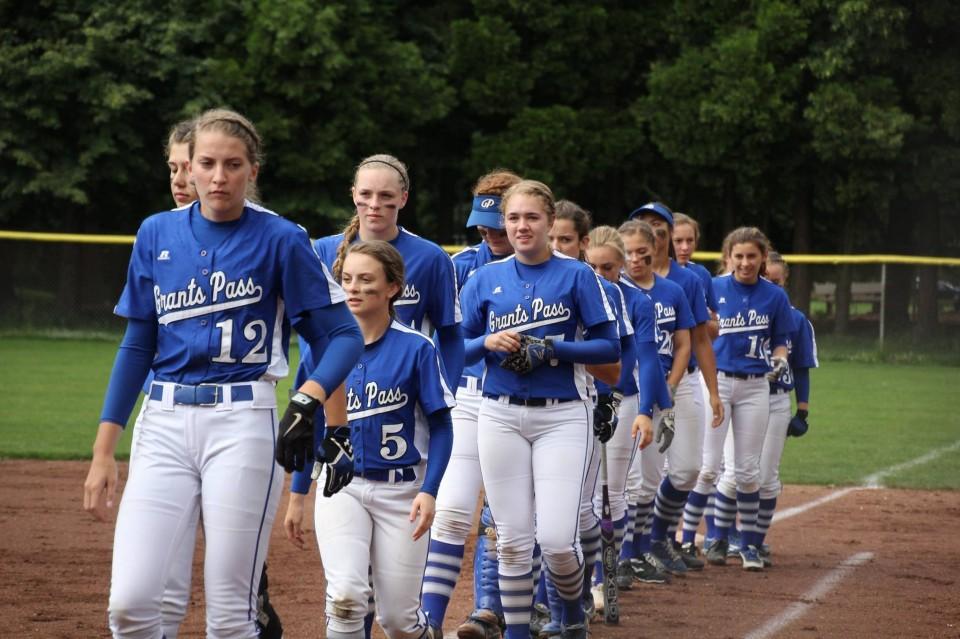 Grants Pass softball, which covered 1,500 miles to win three games