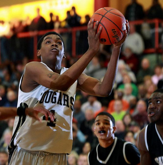 Boys basketball Harrisburg's balanced Cougars enjoy first state win in four seasons, beat