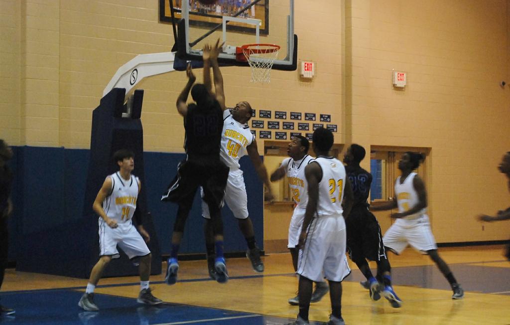 Booker T Washington wins battle at free throw line edges Opp 64
