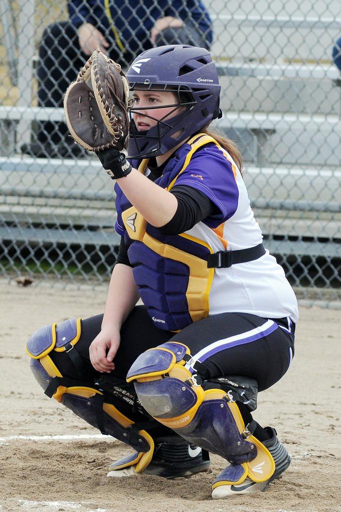 Taylor Cross like a quarterback behind the plate for Caledonia softball