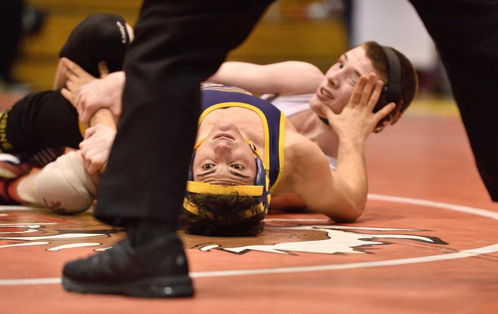 Wrestling Top 20 Rising Group 1 emerges, state champ out, 2 new teams